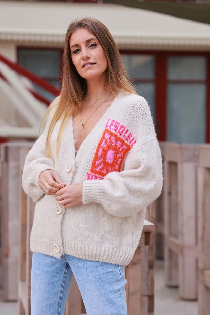 Gilet beige en grosse maille avec gros boutons le Soleil manches bouffantes