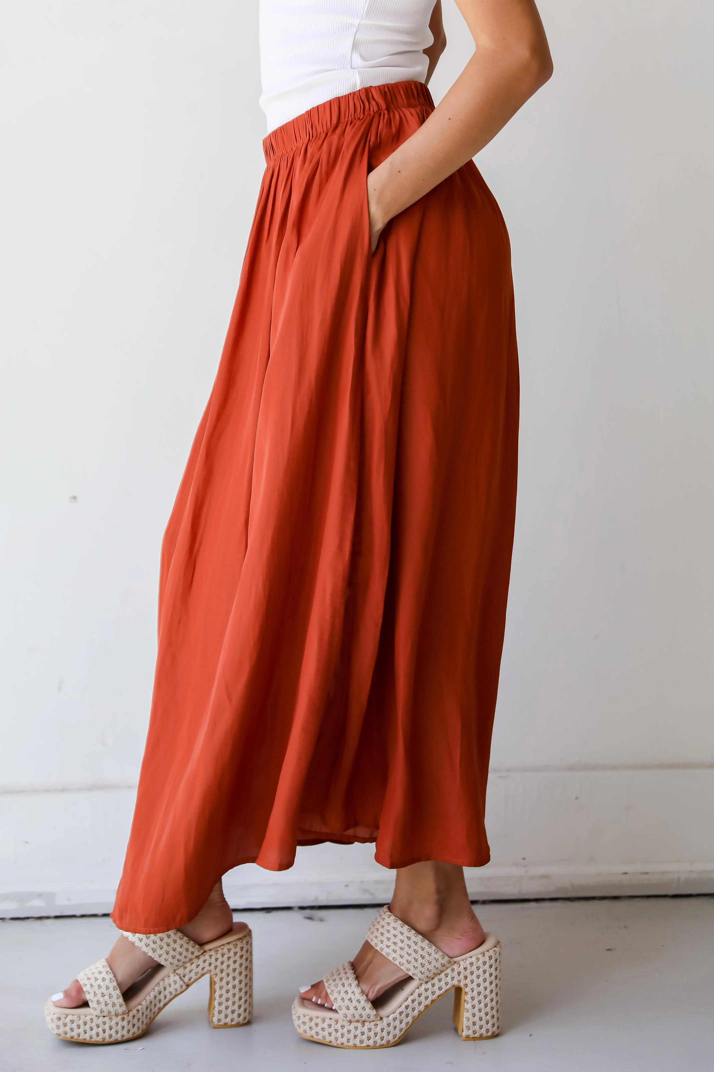 Lovely Intent Rust Satin Midi Skirt