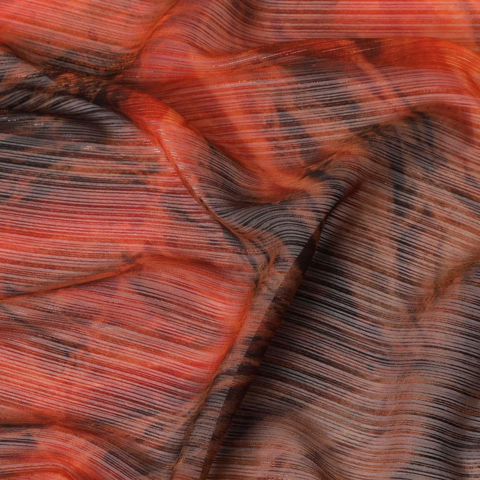 Squash orange synthetic chiffon fabric having tie and die print with metallic lurex in abstract design-D10339